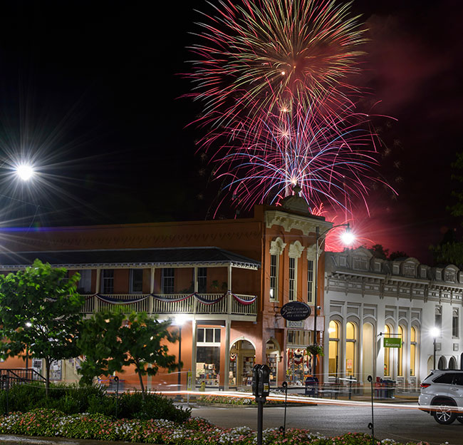Fireworks light up the sky over downtown Oxford, Mississippi during the annual 4th of July fireworks show
