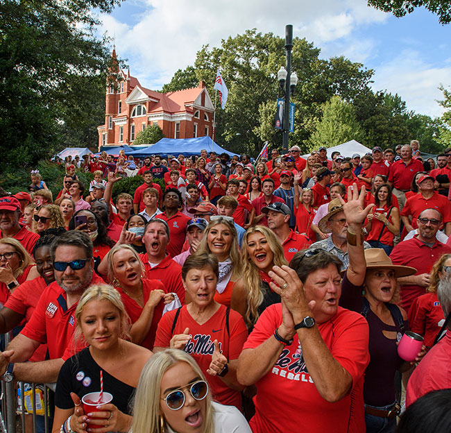 Crowds gather in the Grove every Saturday during football season to cheer on the Ole Miss team as they make the trek down the Walk of Champions to the stadium.