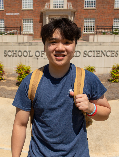 portrait of Andy outside of the Applied Sciences building