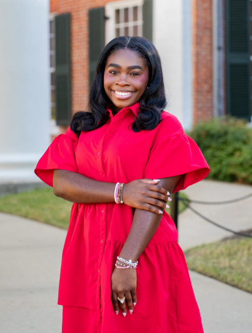 Kadynce Johnson standing in front of the Lyceum