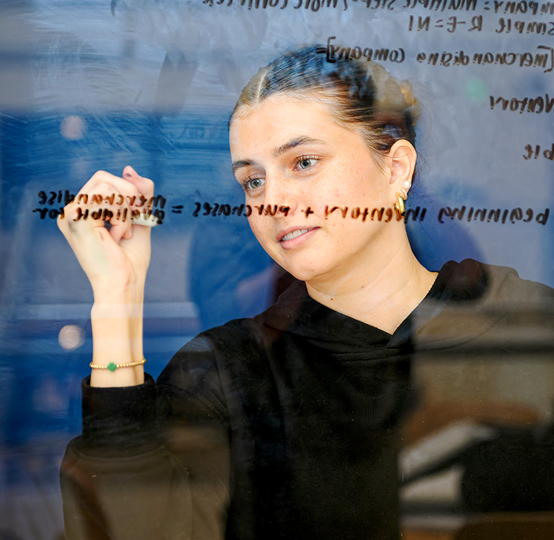 UM student working on a brainstorm session