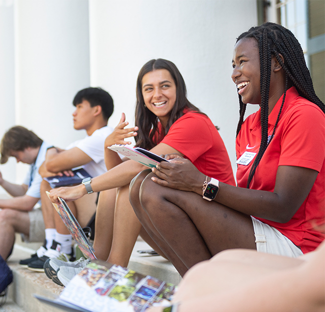 students talking on stairs