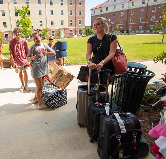 Ole Miss freshmen arrive at their residence halls during Move-in Day.