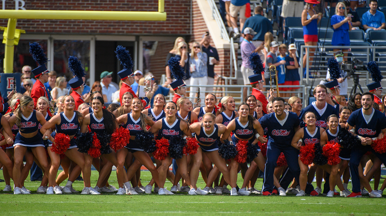 The Ole Miss Cheerleaders lock the Vaught before the kickoff.