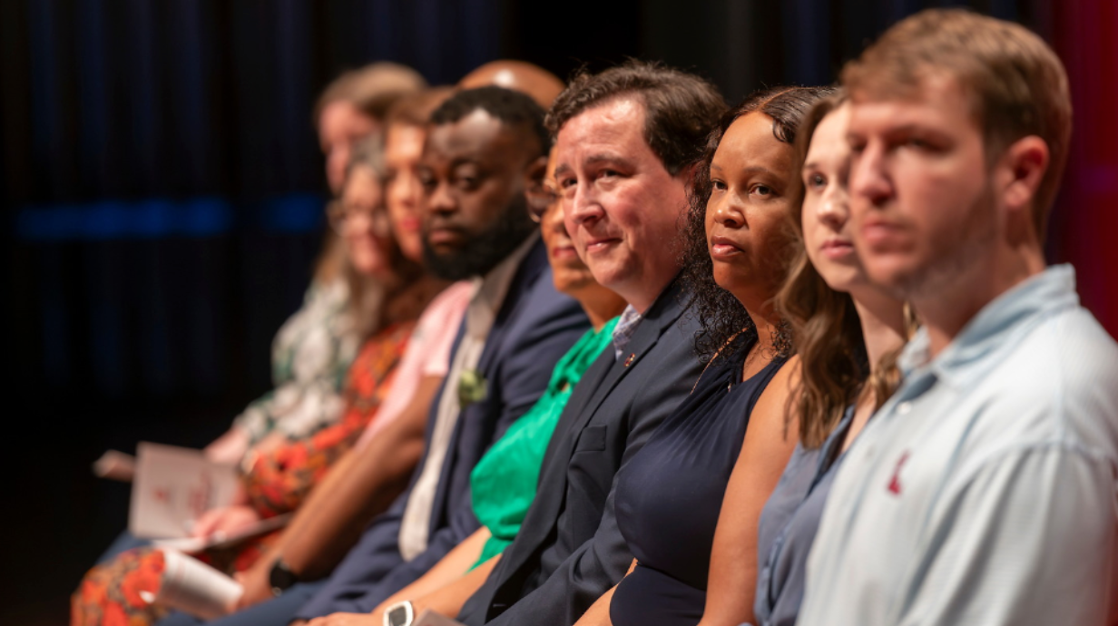 Red and Blue Celebration for graduating staff members at Ford Center