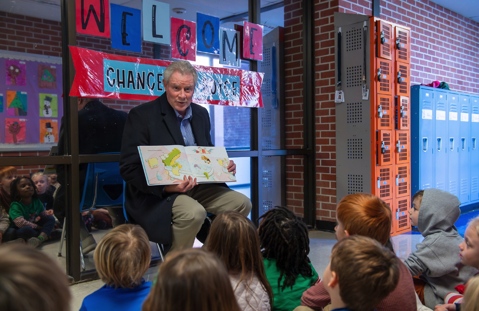 Chancellor Glenn Boyce reads to the children at Willie Price Daycare