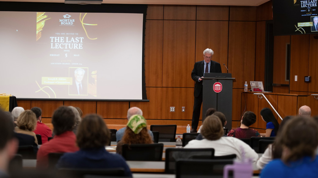 Joseph B. Atkins, a professor of Journalism retiring from the School of Journalism and New Media delivers a lecture at The Last Lecture event 