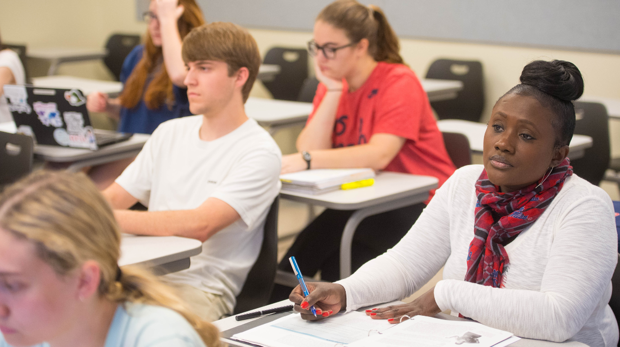 Photo of Precious Pratt Thompson takes an Intro to Music class as a part of HR's Further Education (Tuition) benefit for faculty and staff.