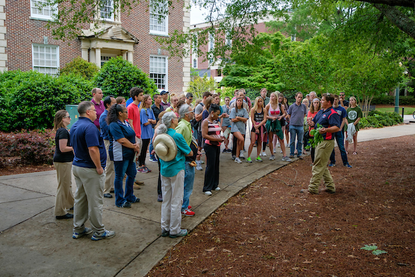 Assistant Director, Nathan Lazinsky teaching the community about the trees of Ole Miss.