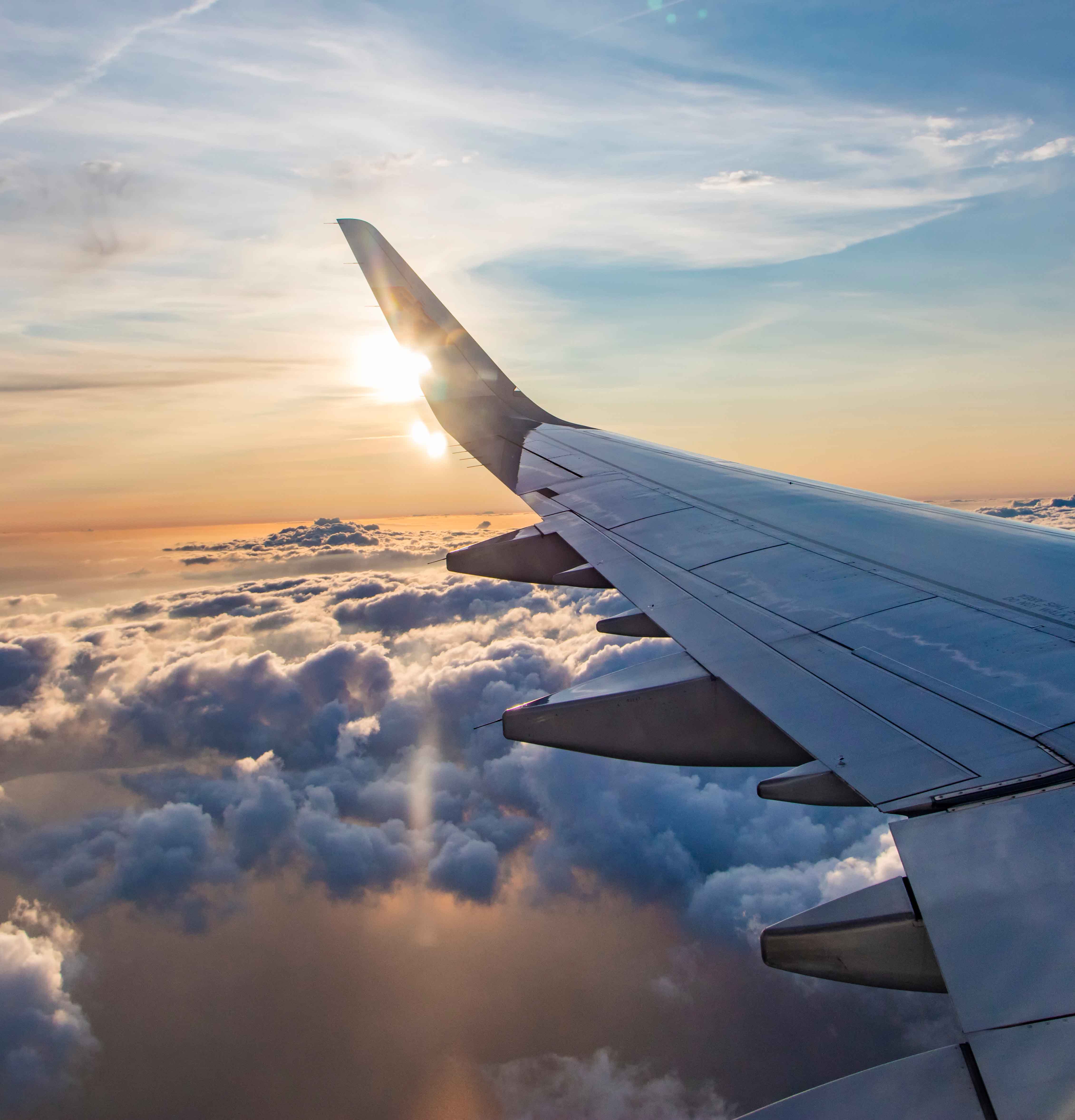 airplane wing in the clouds