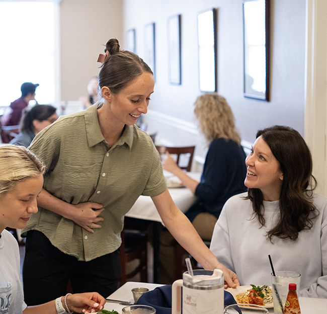 Ole Miss Nutrition and Hospitality Management students prepare and serve meals at the Lenoir Hall dining facility.