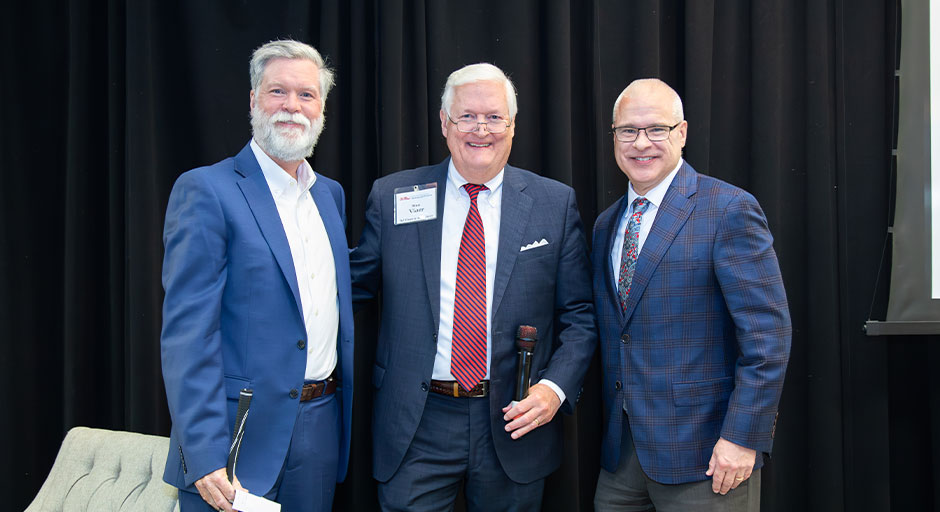 Ken Cyree, Stan Viner, and Noel Wilkin at the 2025 symposium.