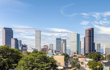 Photo of Denver skyline. Source: Wiki