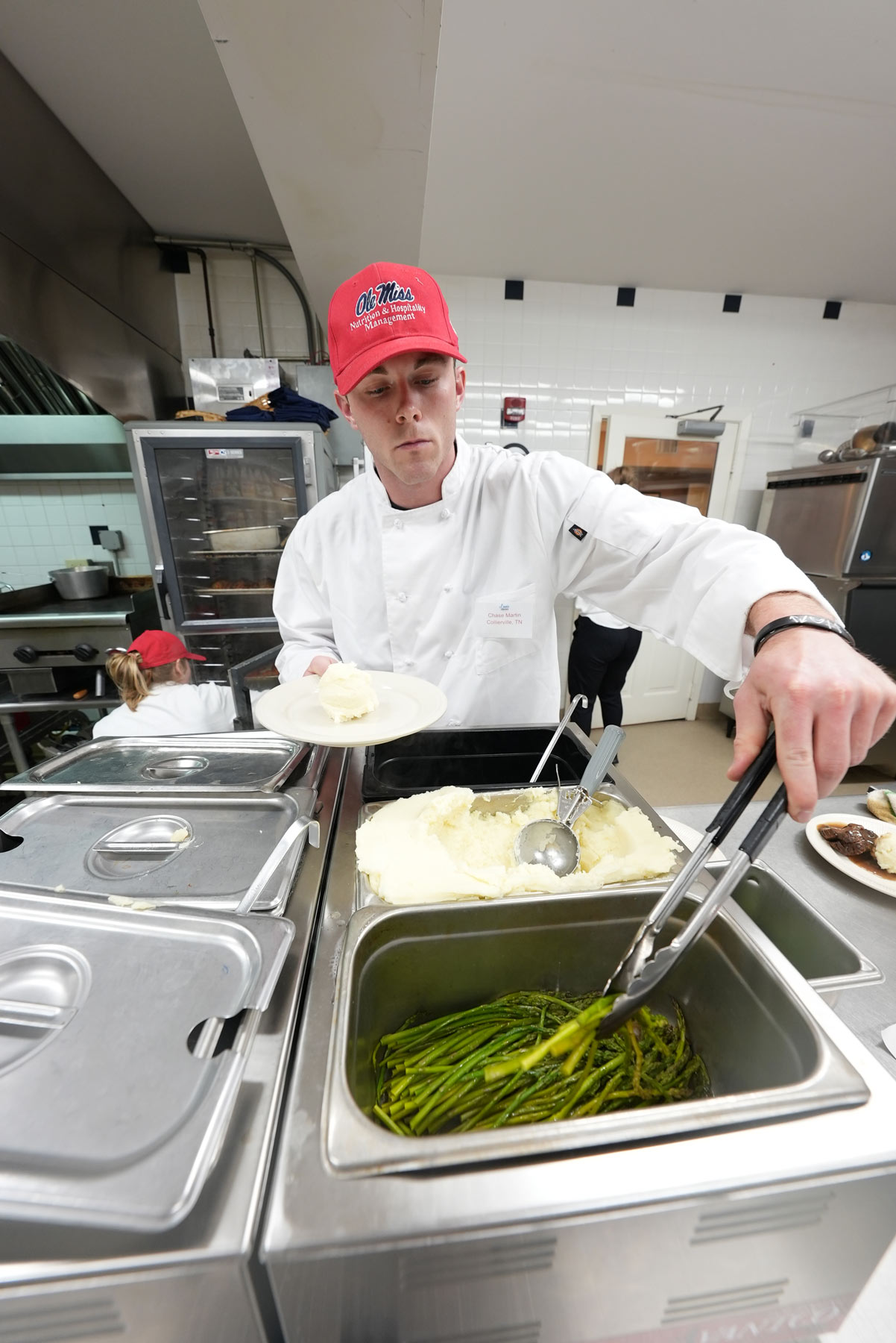 Student serving food