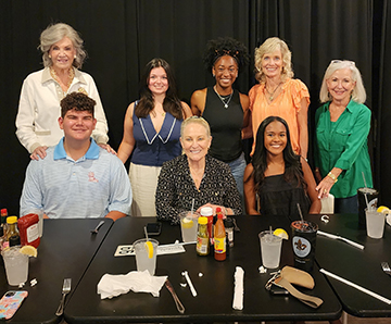 group of mentors and students posing for picture