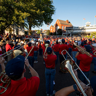 Members of the Ole Miss Band play during a pep rally on the Square