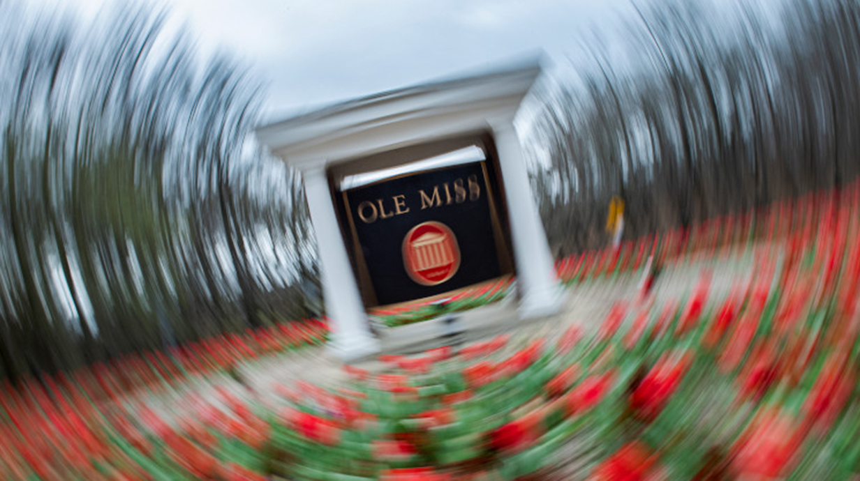 Ole Miss sign greets those who enter campus in spring time