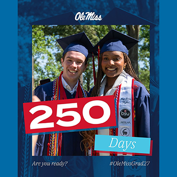 Two Ole Miss graduates in caps and gowns pose together with a graphic reading “250 Days,” “Are you ready?” and “#OleMissGrad27.”