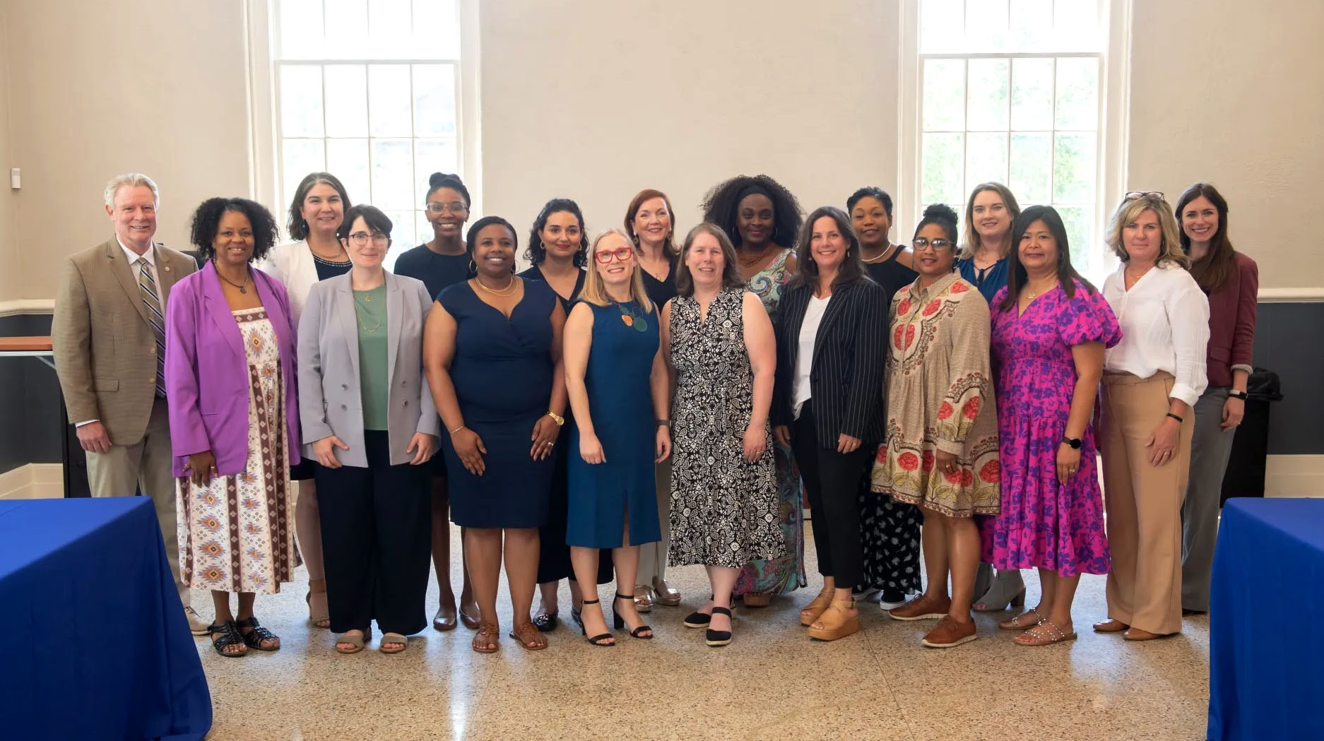 commission on the status of women pose for a group photo