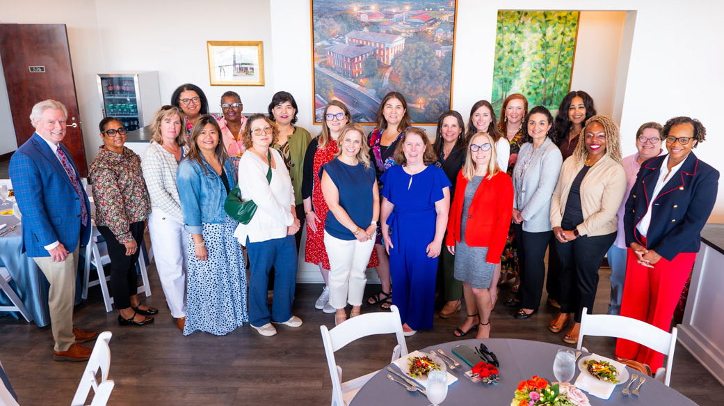 commission on the status of women pose for a group photo