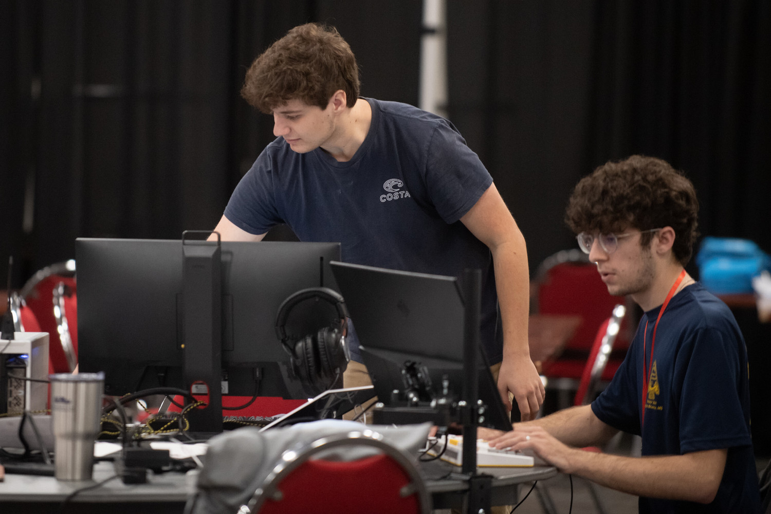 Two student teammates participating in Hack Beta hackathon.