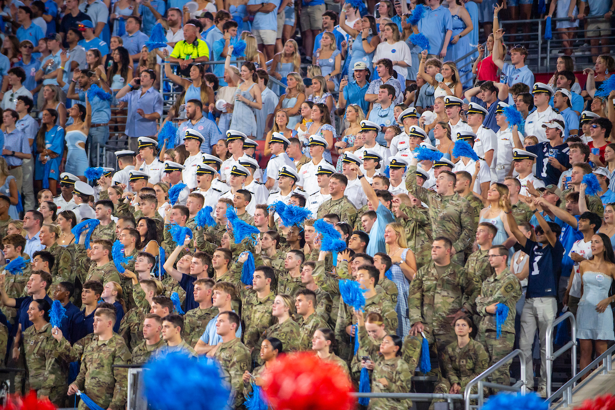 large group of vets at football game in stands