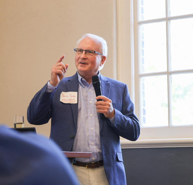 Jerry Jordan giving a presentation.