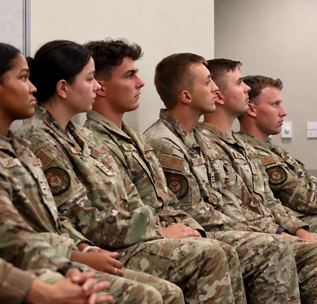 Air Force Cadets sitting and looking to right