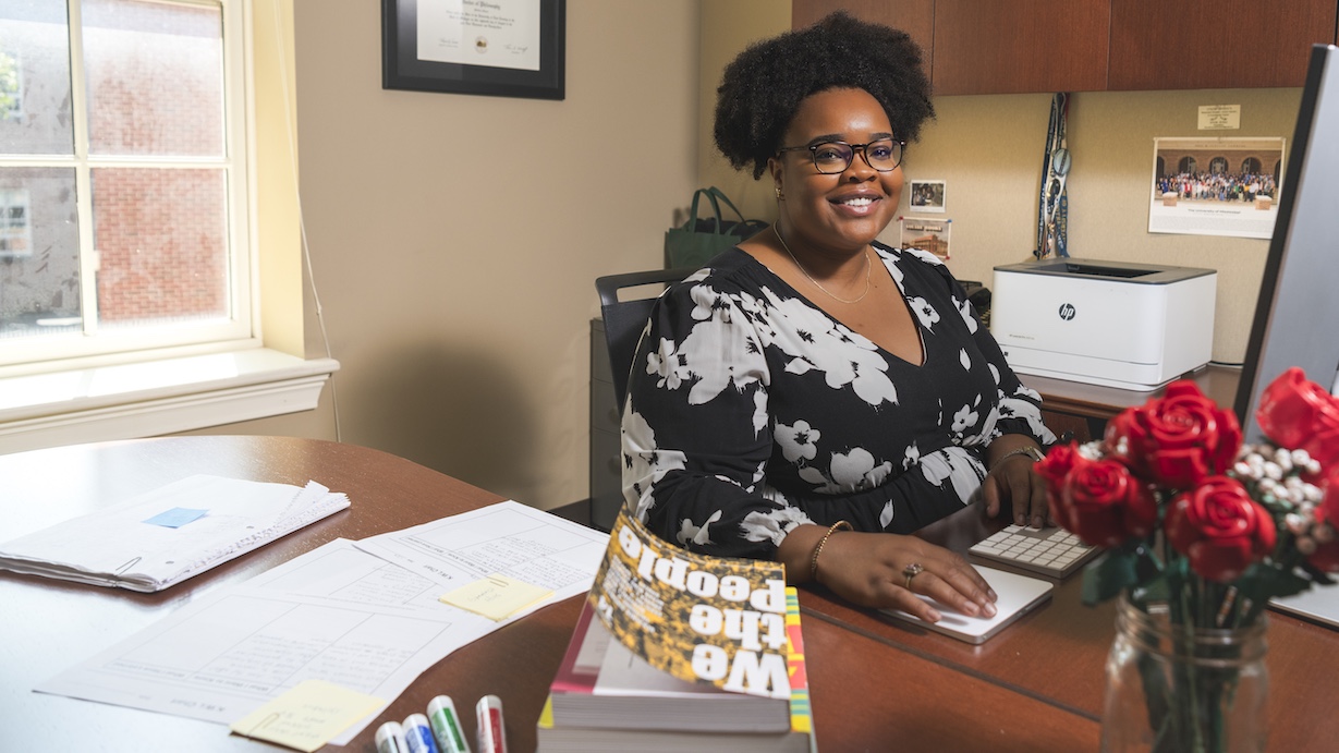 professor Dickinson at her desk