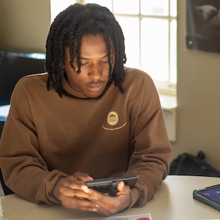 student in lounge
