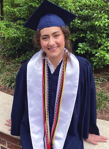 portrait of person in cap and gown