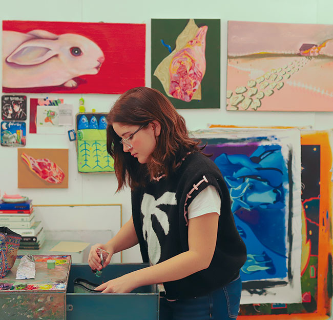 student in painting studio
