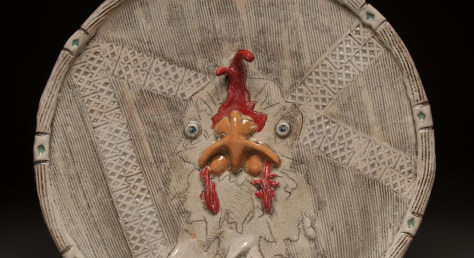 ceramic chicken piece on a plate