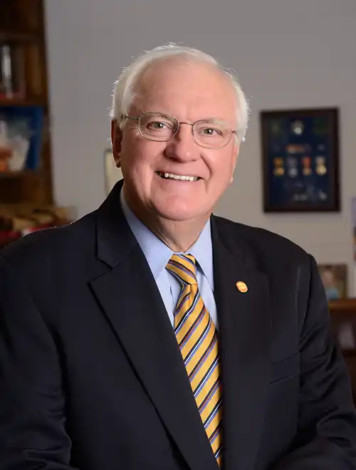 formal portrait of Charles Hussey in a suit