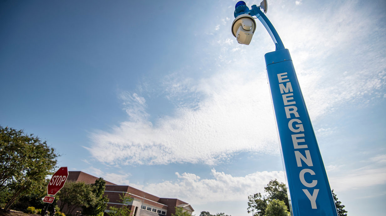 blue emergency contact pole outside