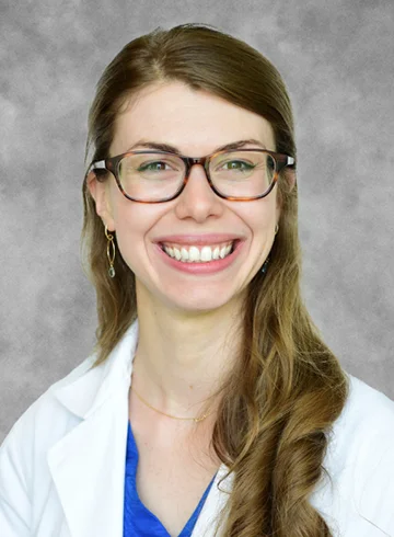 formal portrait of smiling Julie Dhossche
