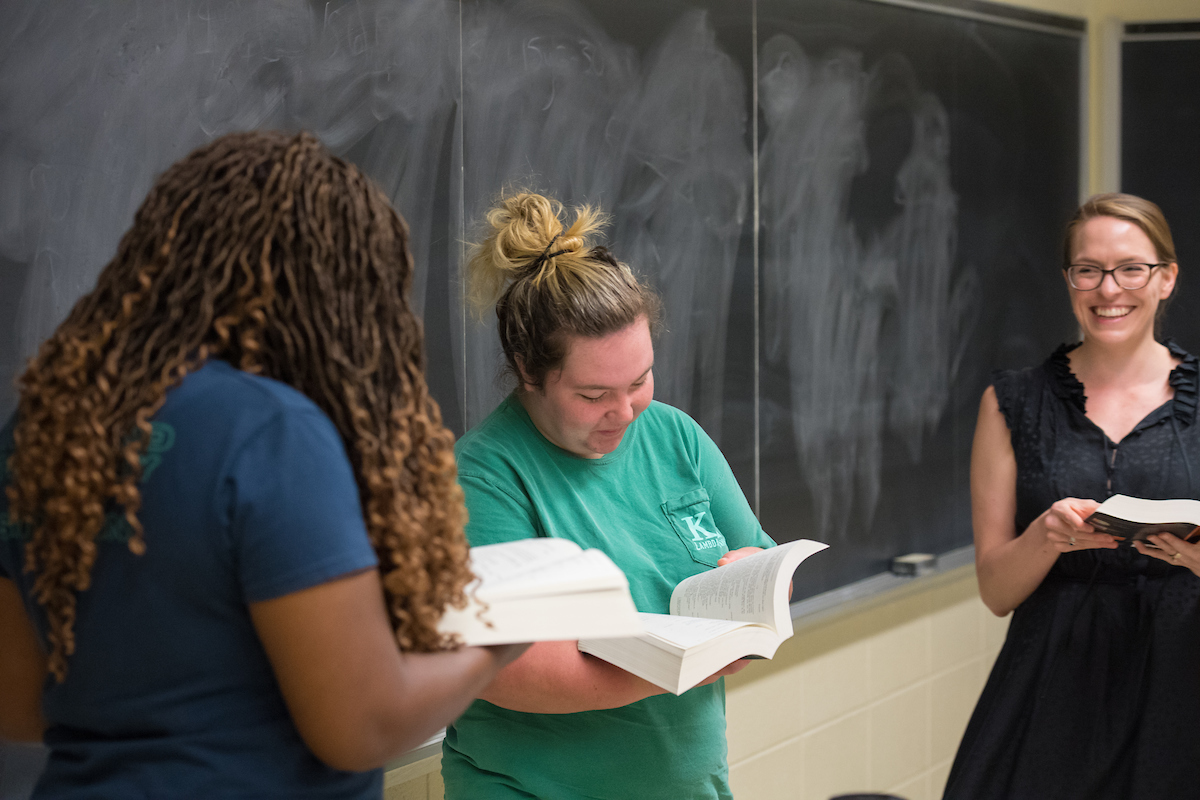 English undergraduate students look over their work.
