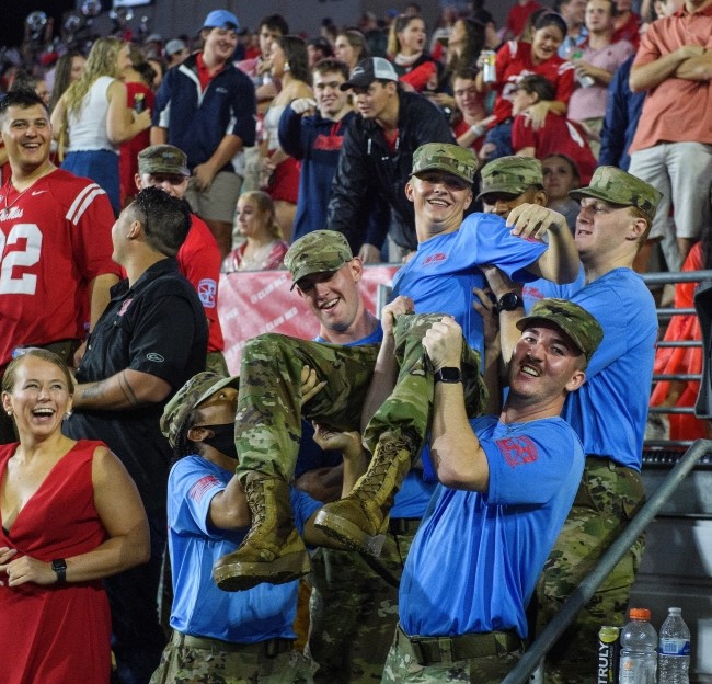 image of cadets having fun in the football stands