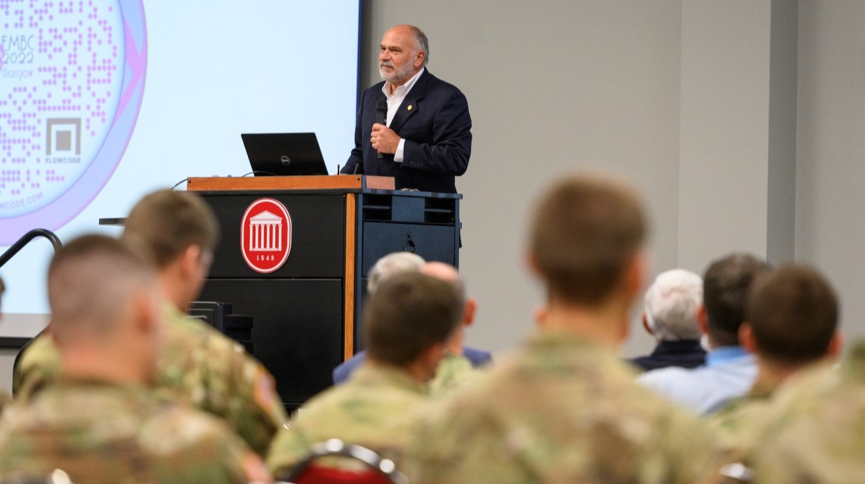 a guest speaker talking about leadership to a group of cadets