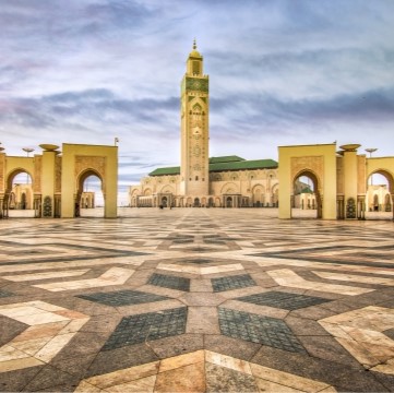 image of a mosque and a tile plaza