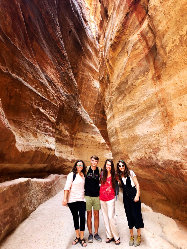 image of a few students standing in a desert cavern