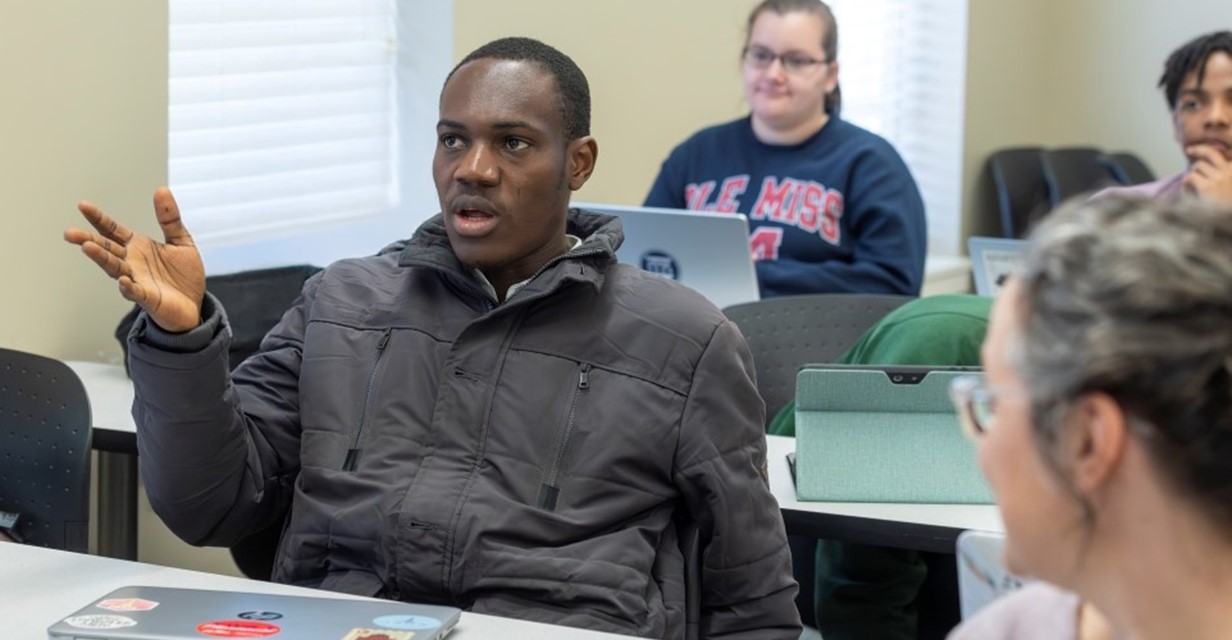 student talking in a class