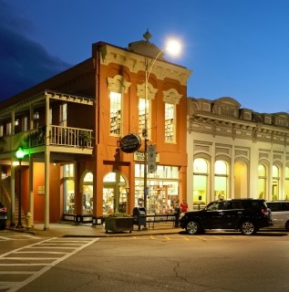 evening photo of Square Books building on the Oxford Square