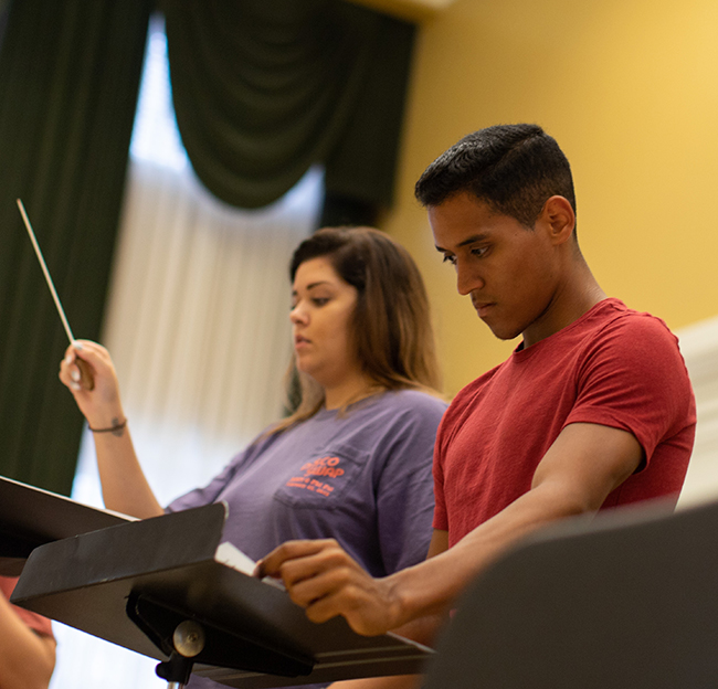 students practicing an ensemble performance