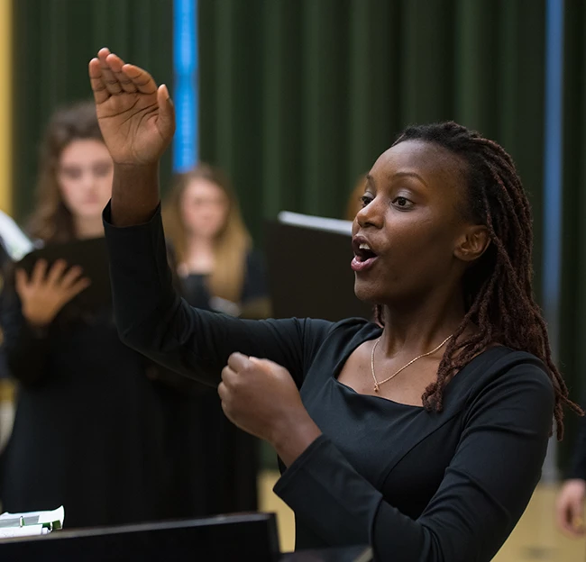 The choir sings during a performance