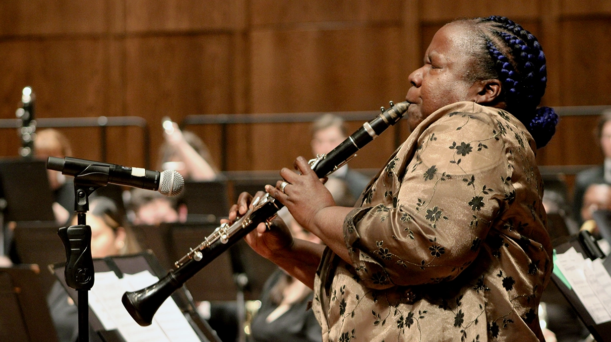 Doreen Ketchens plays clarinet with the Wind Enemble at the Ford Center
