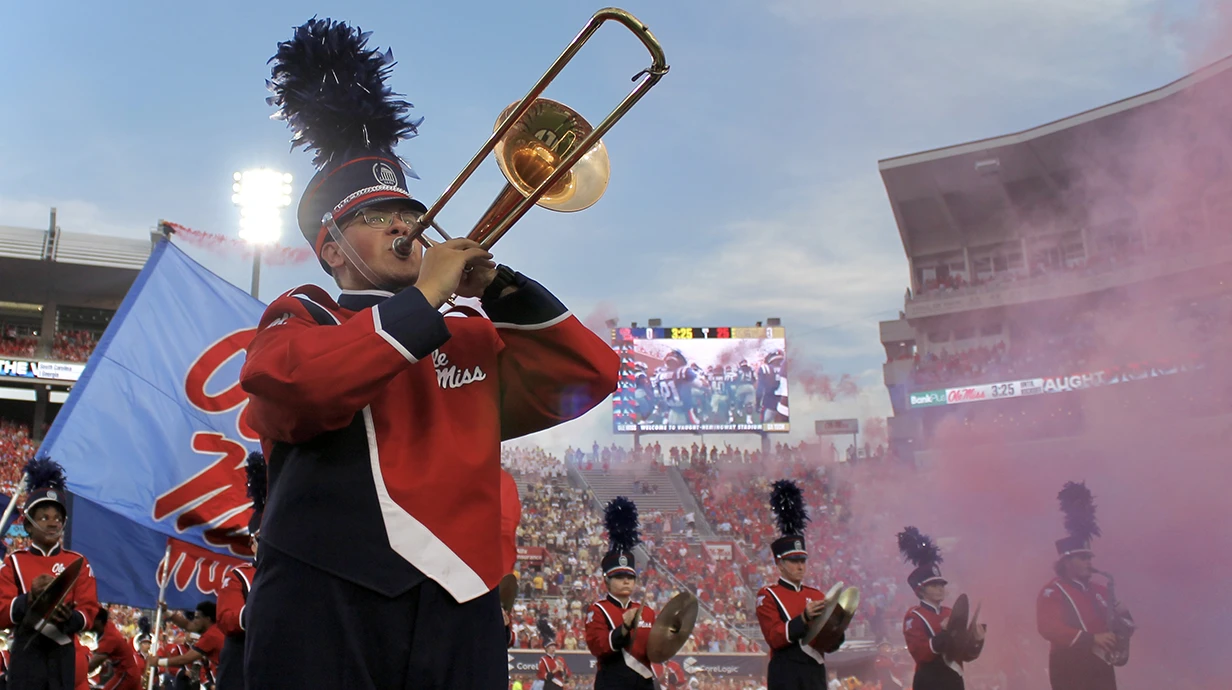 Band member plays an instrument 