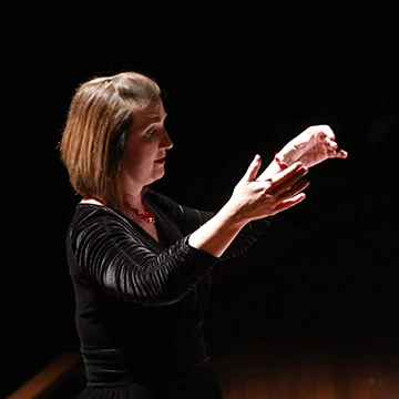 Elizabeth Hearn holds baton