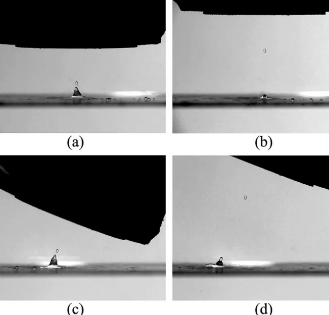 image of a drop of liquid suspended in water