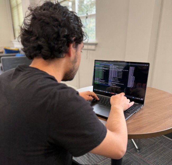 student working at a computer